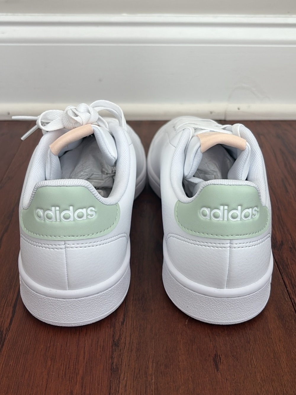 adidas women’s 9.5 White Sneakers with Mint Heel Tab